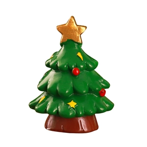 Miniature Christmas tree figurine with golden star topper for holiday tabletop decor