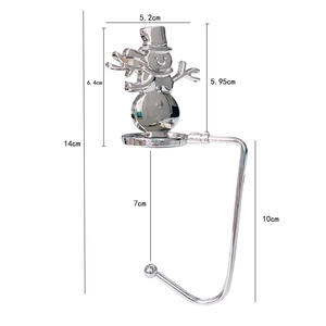 Detailed size chart of a silver metal snowman Christmas stocking hook with dimensions