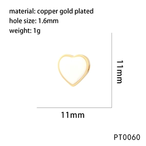 Detail of 11mm heart bead charm in gold-plated copper with 1.6mm hole for jewelry