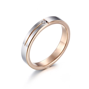 Minimalist tungsten steel ring in rose gold and silver with a single round zircon inlay