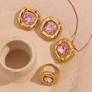 Detail of 18K gold plated square pink zircon jewelry set with earrings, necklace and ring
