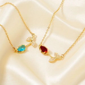 Elegant gold tulip pendant necklaces with blue and red pear-cut zircon gemstones