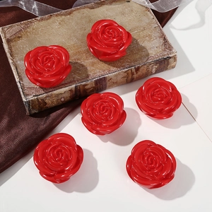 Set of six red rose night lights on vintage books and silk for Valentine's decoration