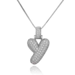 Close-up of silver letter Y pendant necklace with micro-paved cubic zirconia stones