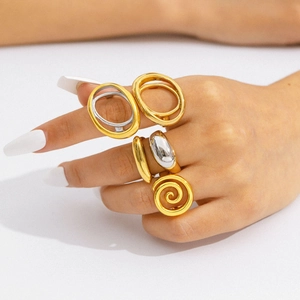 Minimalist stainless steel line design rings in gold and silver finish on a hand