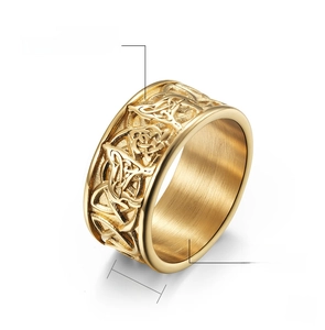 Macro shot of 10mm gold stainless steel ring featuring engraved Celtic knots