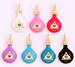 Detail of colorful enamel magic potion bottle pendants featuring golden eye patterns