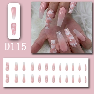 Detailed set of pink gradient coffin nails with white cloud patterns and rhinestones