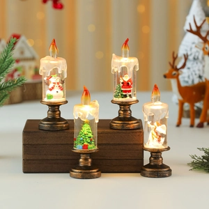 Set of four bronze Christmas LED candle lanterns with snowman and santa claus inside