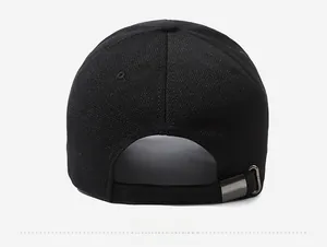 Rear view of black baseball cap showing the adjustable metal buckle and canvas texture