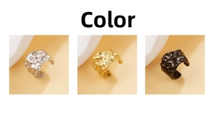 Detailed close-up of U-shaped ear cuffs with hammered texture in gold, silver, and black