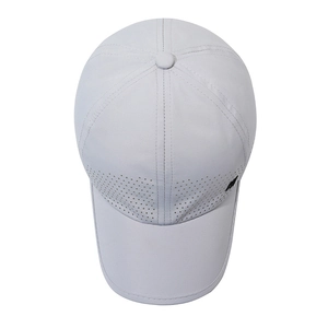 Light gray quick-dry baseball cap with laser-cut ventilation holes and side logo detail