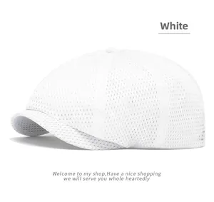 Detail of white mesh newsboy cap showing breathable hollow texture for summer sun protection