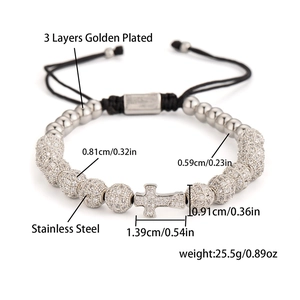 Detail of 3 layers golden plated stainless steel cross bracelet with micro pave zircon beads