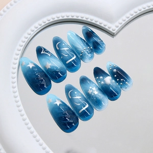 Blue gradient almond press-on nails with 3D heart, pearls and silver star moon art