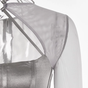 Macro shot of grey satin bodice with sheer mesh panels and delicate shoulder straps
