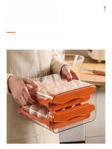 Double-layer stackable egg drawer with transparent shell and orange recessed handles