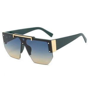Fashionable oversized flat top sunglasses with blue-yellow gradient lenses and gold bridge
