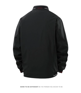 Detail of black men's jacket back view with red and white striped cuffs and collar