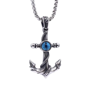 Anker-Anhänger aus Titanstahl mit blauem Evil Eye an einer silbernen Halskette