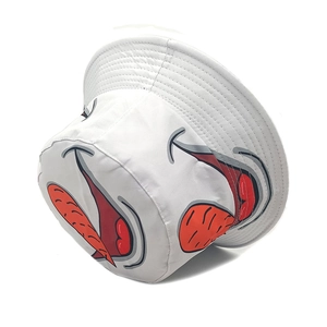 Detail view of the stitching and cartoon mouth print on white canvas bucket hat