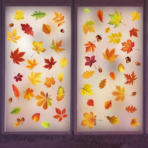 Autumn window clings with maple leaves and acorns in warm fall colors for seasonal decor
