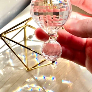 LED crystal disco ball stage bulb creating vibrant rainbow rotating lighting effects