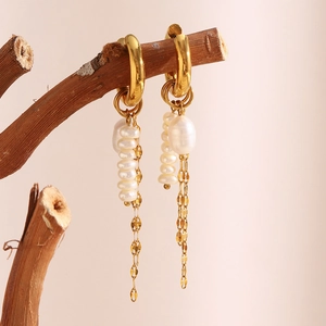 18K gold plated stainless steel pearl hoop earrings with tassel chains on a branch