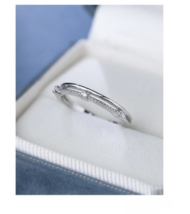 Macro shot of S925 sterling silver double layer ring with zircon in a blue jewelry box