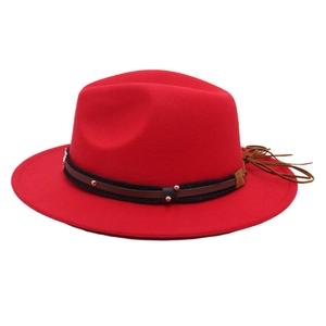 Red wide-brimmed felt hat with black woven band and metallic stud detailing