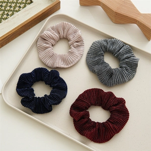 Set of four shimmering pleated polyester scrunchies in pink, grey, blue, and burgundy