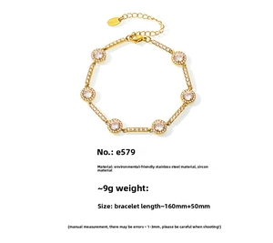Macro view of PVD 18K gold plated stainless steel bracelet with cubic zirconia inlay