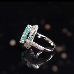 Luxurious S925 silver ring featuring a large rectangular mint green gemstone and pave diamonds