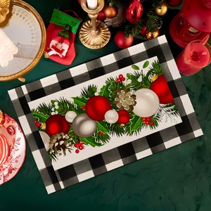 Christmas placemat with buffalo plaid and festive ornaments on a cozy holiday table