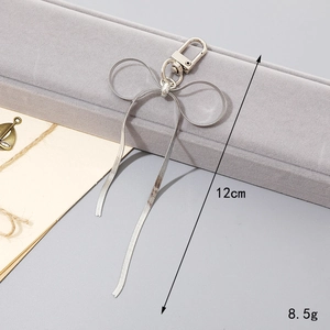 Pendentif nœud papillon minimaliste en métal argenté chaîne serpent pour téléphone