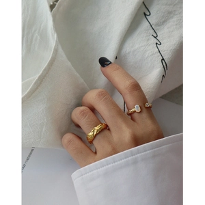 Minimalist S925 silver textured gold ring set with white opal stone and vintage finish