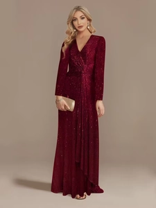 Detail of V-neck sequin evening dress with waist knot and shimmering dark red fabric