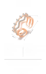 Macro detail of wave-shaped open ring with 36 sparkling cubic zirconia stones and dual layers