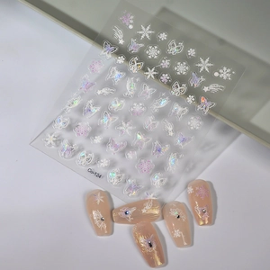 Holographic butterfly nail stickers and colorful snowflake decals for manicure art