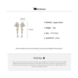 Detailed size chart showing 7.5cm length and zircon copper material for leaf tassel earrings
