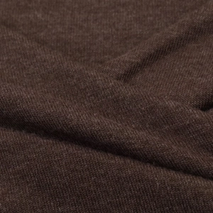 Close-up of the deep brown knitted fabric texture showing soft pleats and woven details