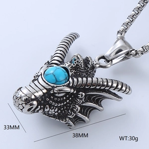 Macro shot of stainless steel dragon head pendant with blue bead eye and dimensions
