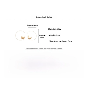 Detail showing asymmetrical gold sun and moon earrings with s925 silver needle parameters
