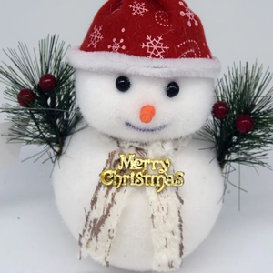 Décoration de bonhomme de neige de Noël blanc avec bonnet rouge et lettrage doré joyeux