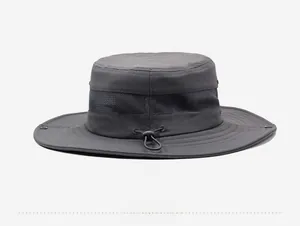 Detail of dark grey sun hat featuring breathable mesh layer and adjustable drawstring cord
