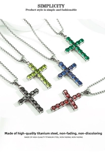 Detail of five titanium steel cross pendants with multi-colored cubic zirconia stones