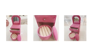 Pink velvet vanity-shaped jewelry box with mirror, drawer and ring storage stool