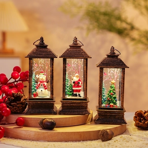 Macro detail of bronze Christmas lanterns with snowman, Santa, and pinecone accents