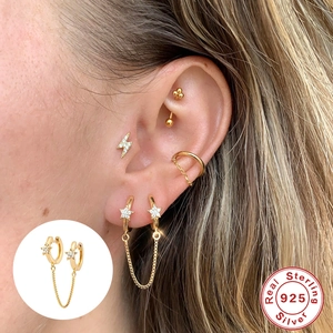 925 sterling silver gold star chain earrings shown on model for a trendy minimalist look