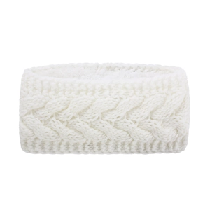 Detail of pure white cable knit texture on a thick warm winter headband accessory